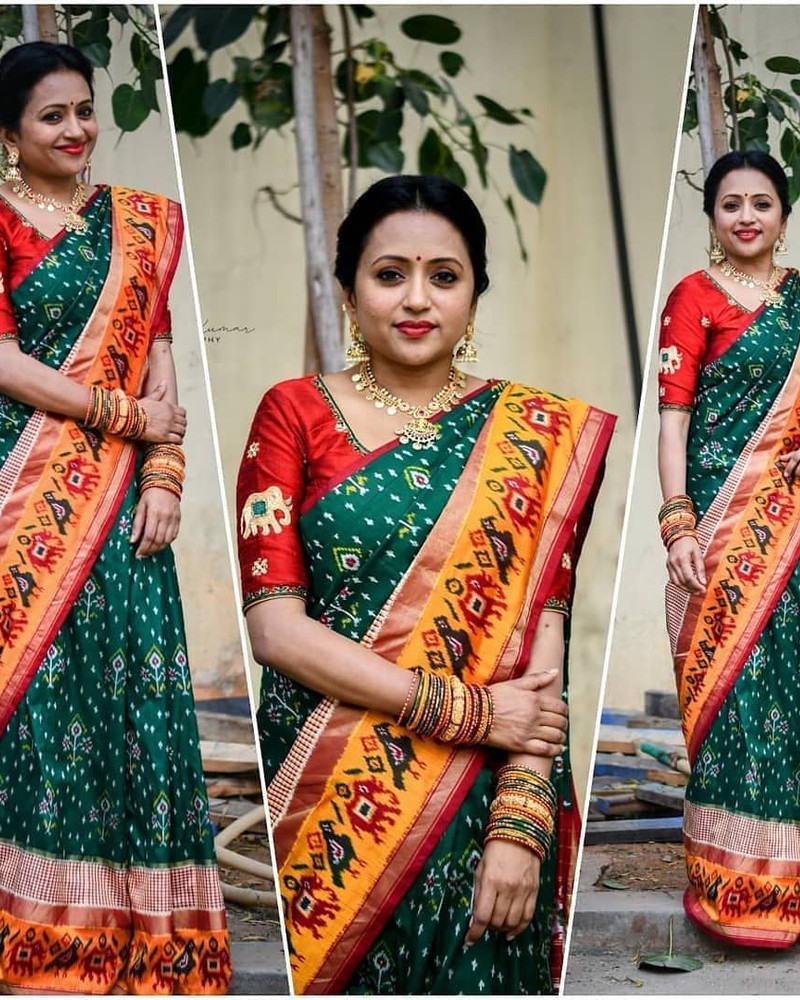 Bottlegreen pochampally Ikkat saree with orange border Designr.me